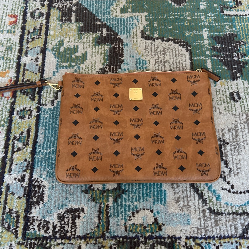 MCM brown leather clutch